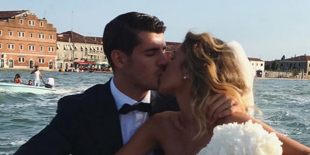 Photograph, Romance, Love, Bride, Wedding dress, Forehead, Interaction, Kiss, Honeymoon, Bridal clothing, 