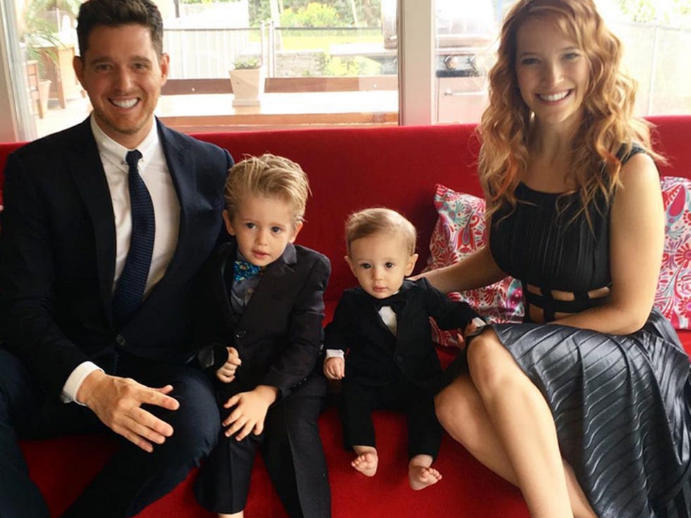 People, Suit, Event, Formal wear, Tuxedo, Child, Family, Sitting, Family pictures, Smile, 