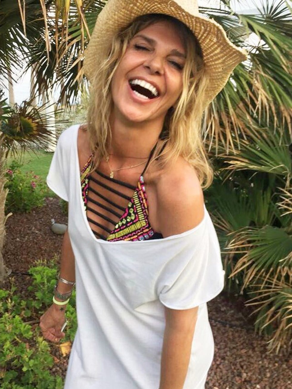 Clothing, Hat, Shoulder, Facial expression, Fashion accessory, People in nature, Jaw, Costume accessory, Tooth, Headgear, 