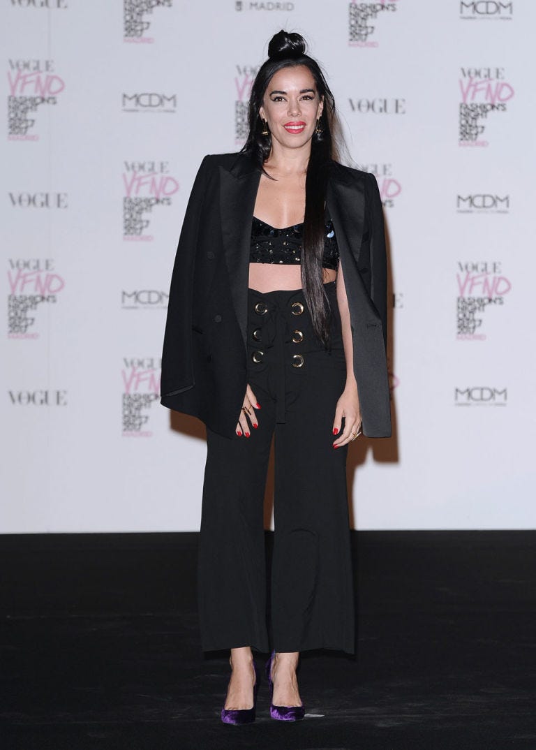 Clothing, Fashion, Carpet, Fashion design, Event, Outerwear, Premiere, Long hair, Dress, Flooring, 