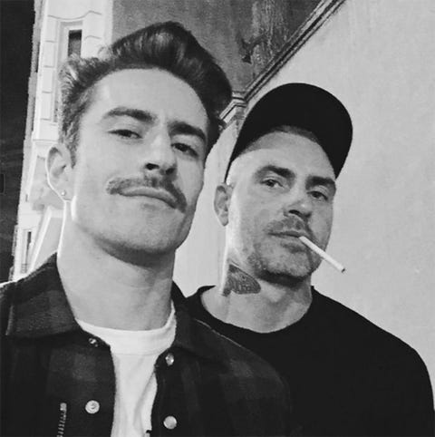 Forehead, Chin, Moustache, Black-and-white, Photography, Facial hair, Smile, Cap, 