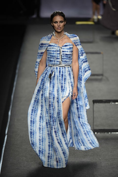 Fashion model, Fashion, Fashion show, Runway, Clothing, Blue, Haute couture, Fashion design, Dress, Public event, 