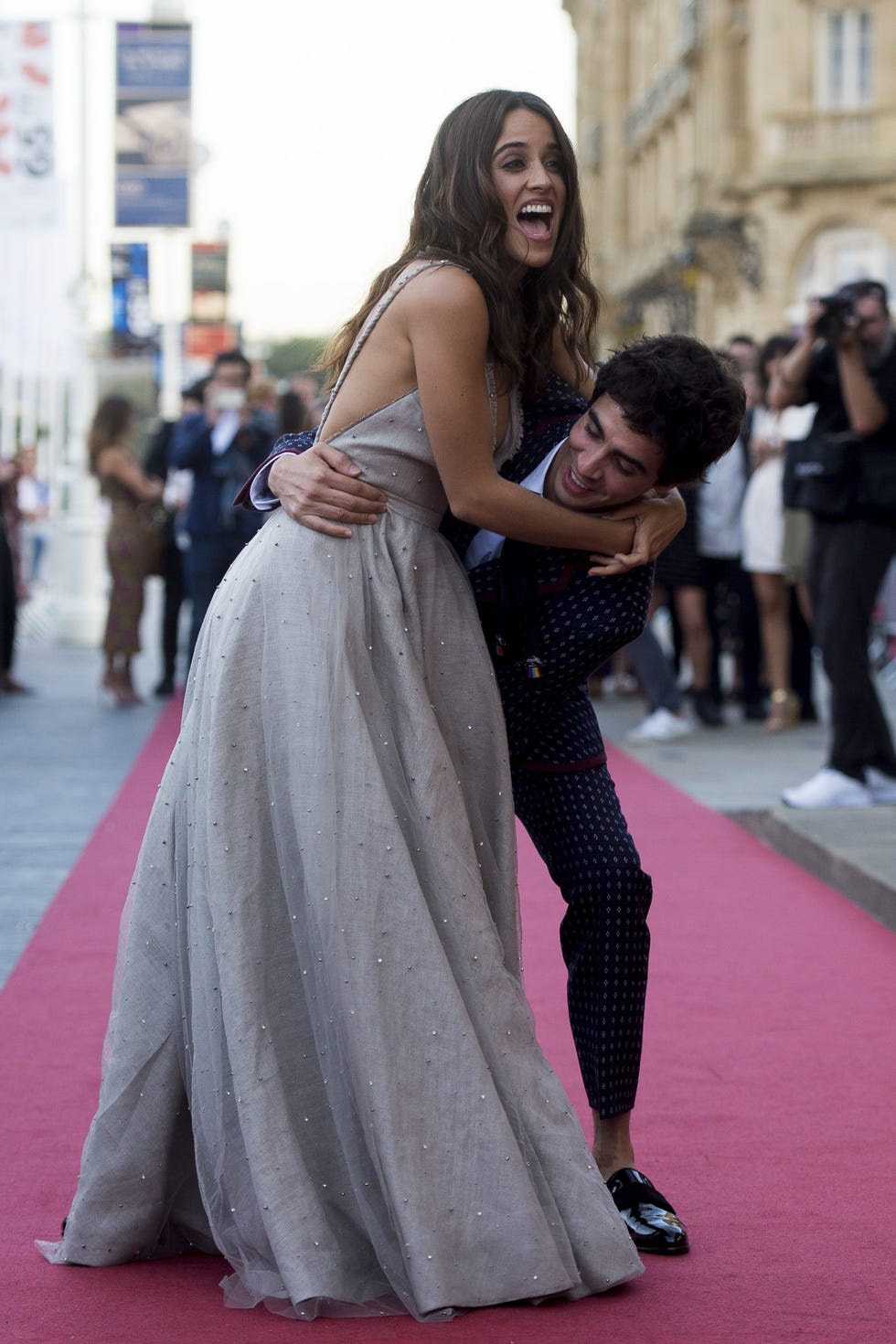 Dress, Clothing, Red carpet, Fashion, Gown, Shoulder, Premiere, Carpet, Flooring, Pink, 