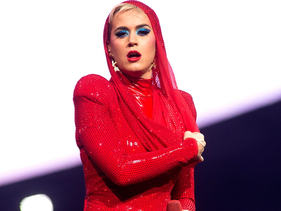 Red, Lip, Fashion model, Beauty, Fashion, Fashion design, Performance, Fun, Music artist, Outerwear, 