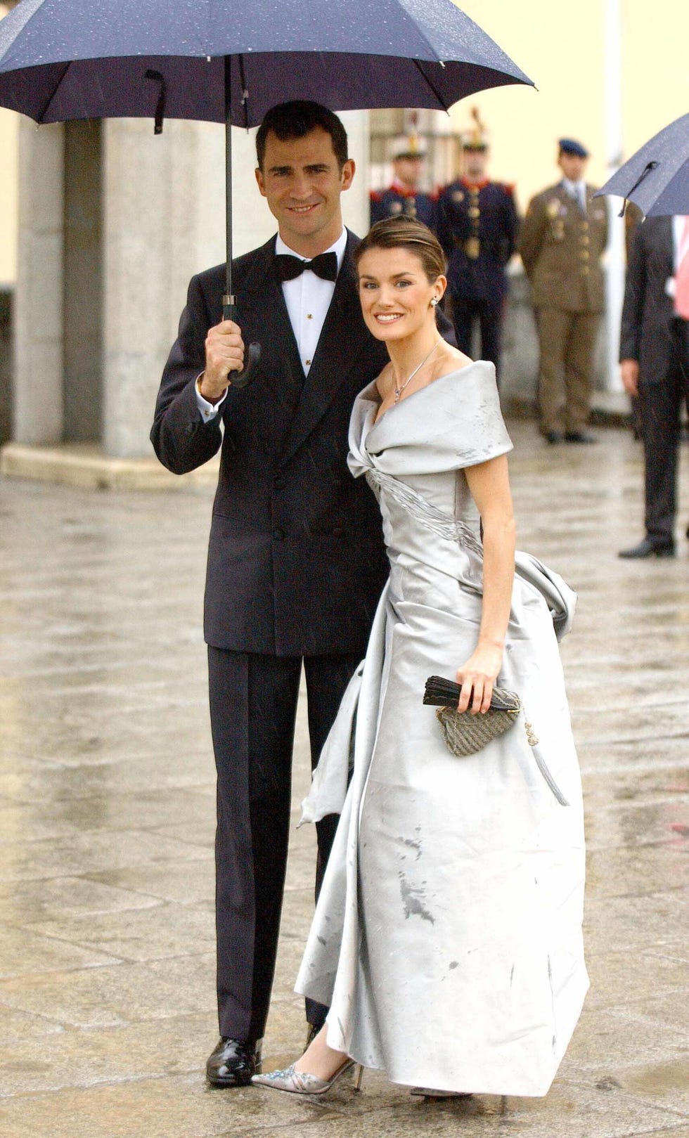Photograph, White, Facial expression, Suit, Formal wear, Dress, Wedding dress, Fashion, Gown, Bridal clothing, 