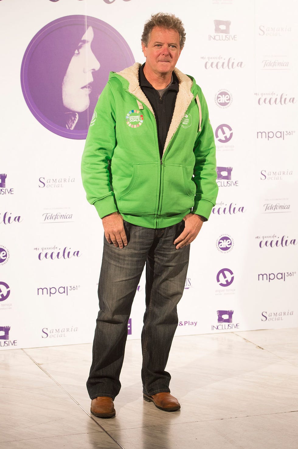 Green, Purple, Fashion, Outerwear, Standing, Human, Jeans, Footwear, Jacket, Fashion design, 