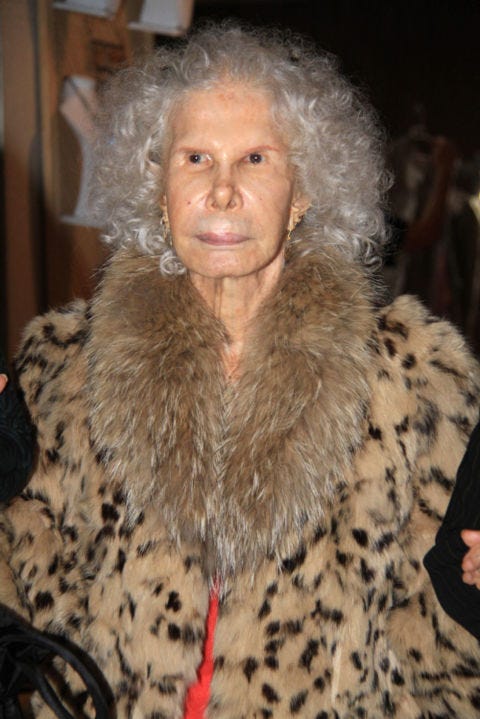 Skin, Textile, Iris, Fur clothing, Fashion, Natural material, Fur, Animal product, Wrinkle, Camouflage, 