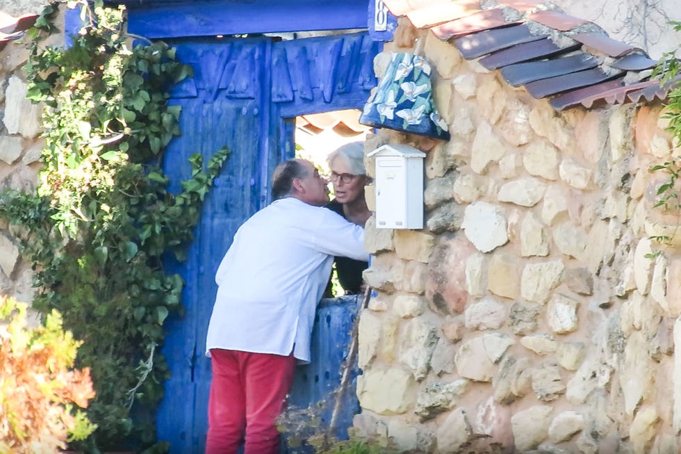 Human, Blue, Majorelle blue, Azure, House, Stone wall, Village, Outhouse, Hut, 