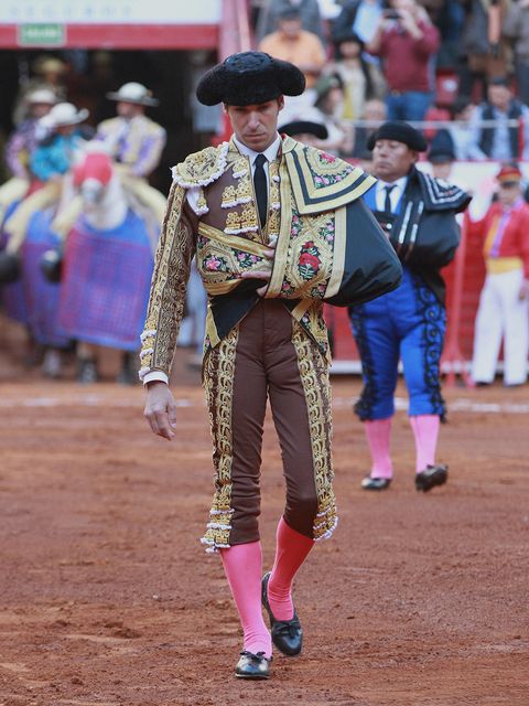 Matador, Bullfighting, Performance, Tradition, Sport venue, Animal sports, Public event, Bullring, Event, Fun, 