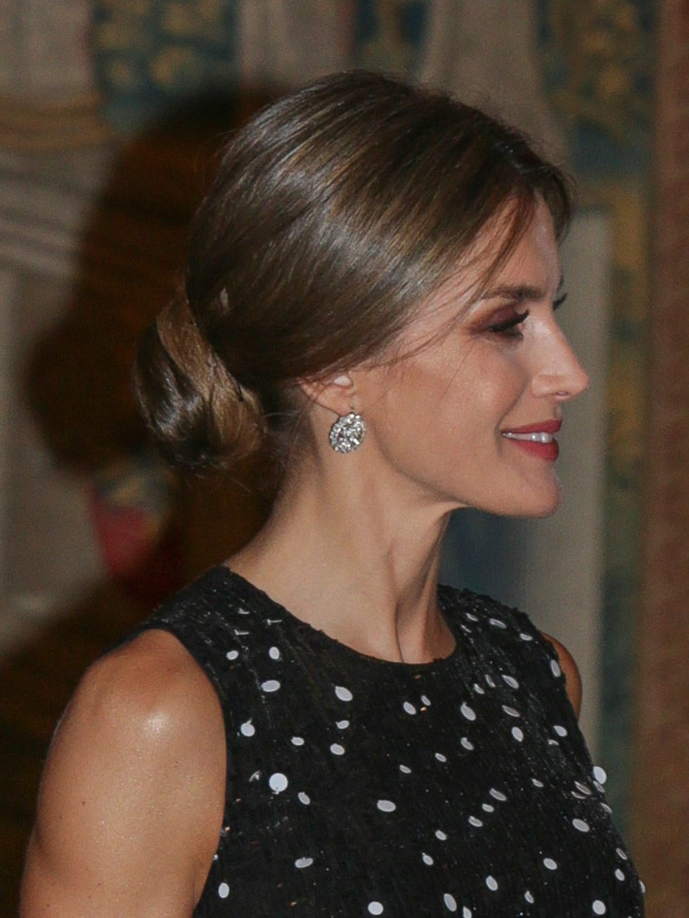 Hair, Hairstyle, Chignon, Chin, Bun, Long hair, Brown hair, Neck, Ear, Black hair, 