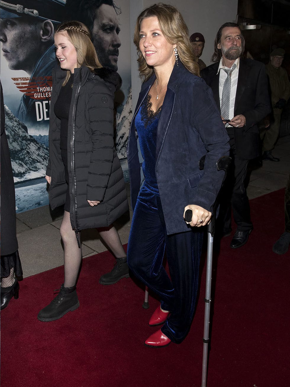Event, Carpet, Red carpet, Outerwear, Premiere, Fashion, Flooring, Suit, Fur, Long hair, 
