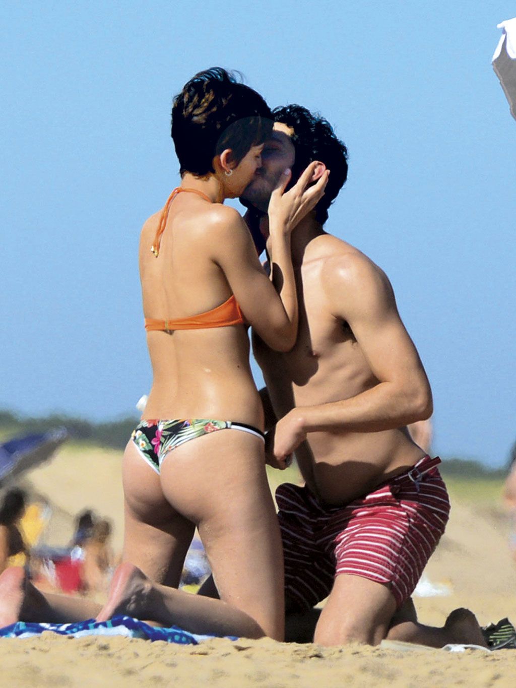 People on beach, Bikini, Beach, Undergarment, Sun tanning, Barechested, Vacation, Summer, Interaction, Fun, 