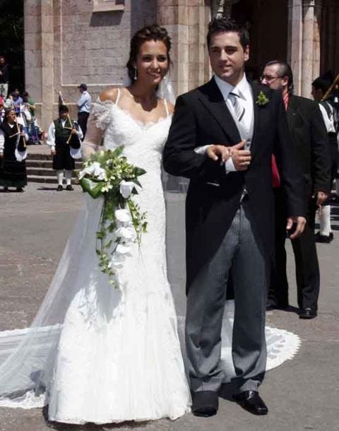 Wedding dress, Gown, Bride, Dress, Bridal clothing, Photograph, Clothing, Facial expression, Formal wear, Suit, 