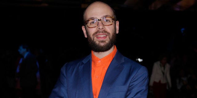 Facial hair, Glasses, Beard, Forehead, Fun, Smile, Event, Suit, Moustache, 
