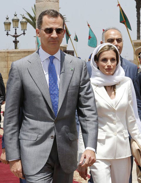 Suit, Formal wear, Fashion, Outerwear, Event, Blazer, Tuxedo, Fun, Eyewear, White-collar worker, 