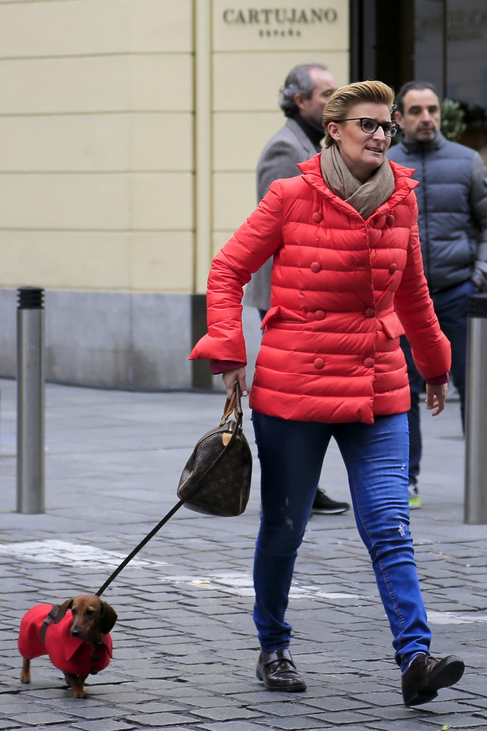 Red, Dog walking, Walking, Leash, Human, Jeans, Fun, Street fashion, Street, Outerwear, 