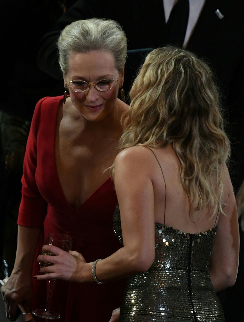 Blond, Fashion, Dress, Human body, Hand, Chest, Cocktail dress, Gesture, 
