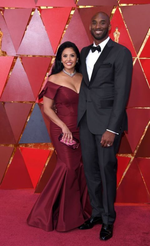 Formal wear, Carpet, Suit, Red carpet, Red, Dress, Tuxedo, Flooring, Event, Premiere, 