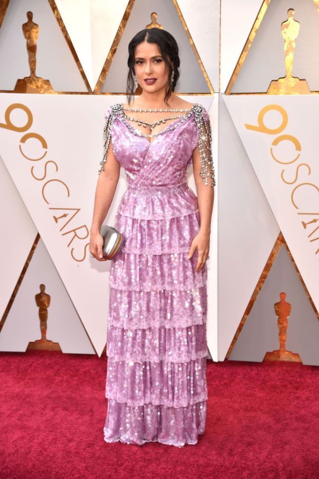 Red carpet, Dress, Clothing, Carpet, Gown, Flooring, Fashion, Purple, Fashion model, Formal wear, 