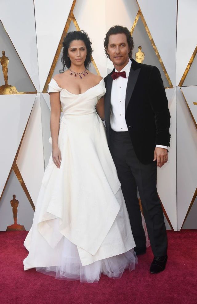 Carpet, Red carpet, Gown, Dress, Clothing, Formal wear, Flooring, Wedding dress, Suit, Event, 