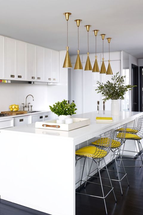 Functional Item Small Kitchen Italian Design the kitchen island and counters are topped with a caesarstone surface the bertoia barstools are