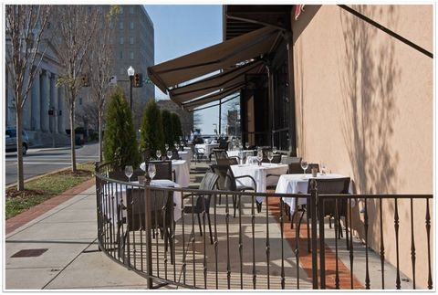 Neighbourhood, Table, Iron, Outdoor table, Restaurant, Real estate, Chair, Tablecloth, Outdoor furniture, Metal, 