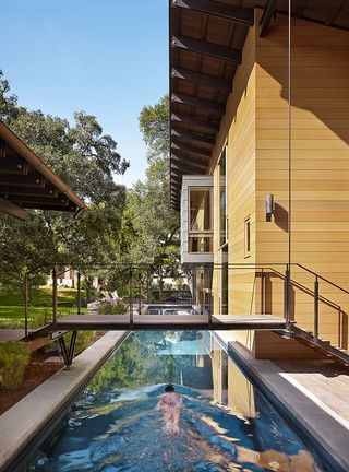 Property, Stairs, Swimming pool, Real estate, House, Residential area, Home, Resort, Shade, Hardwood, 