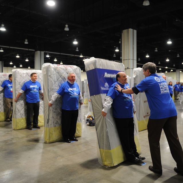 Aaron's Inc. employees earn world record for mattress human dominoes