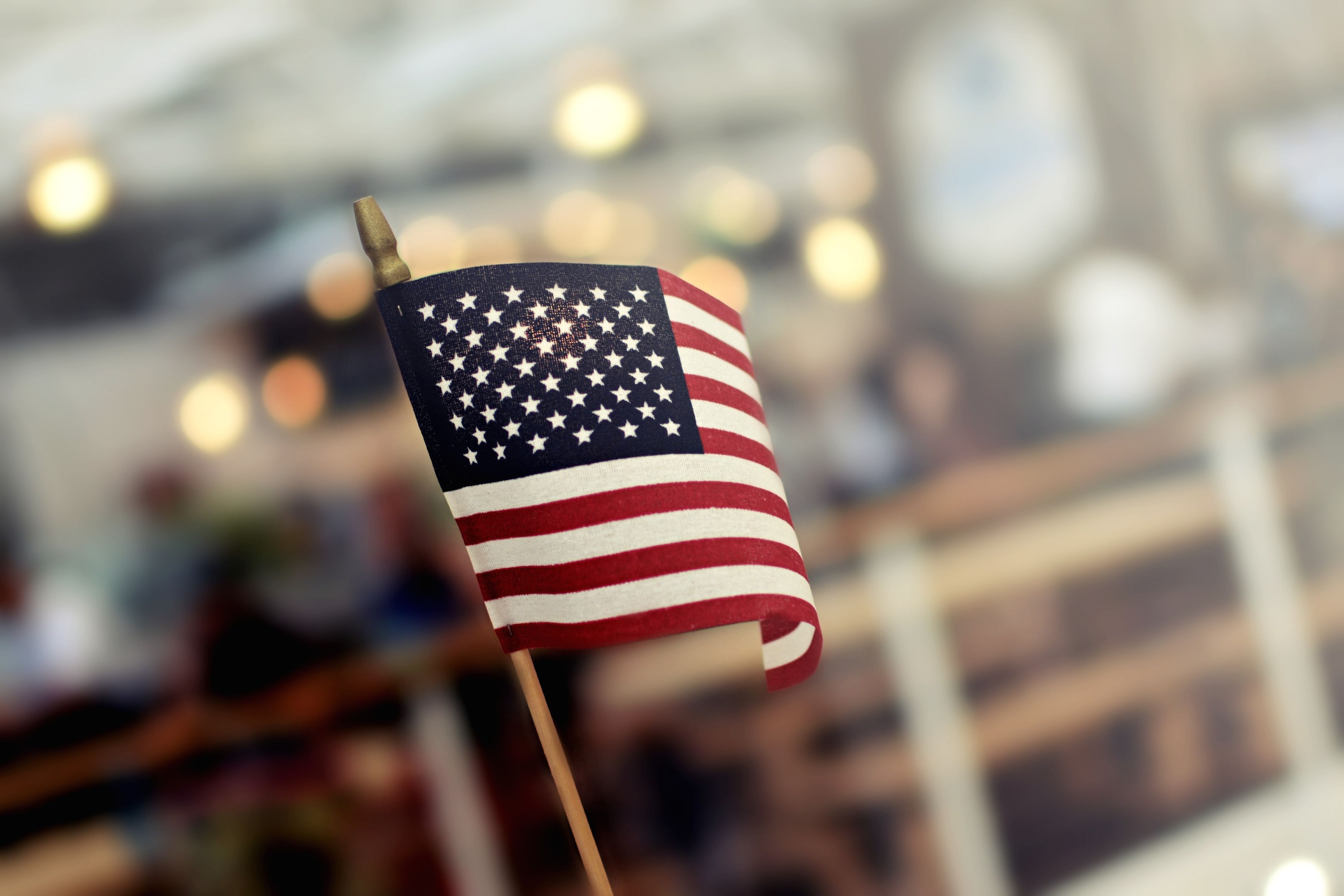 hanging american flag in room