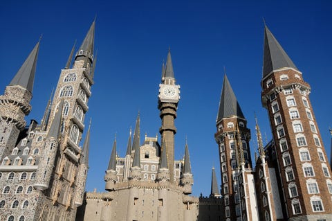 Blue, Architecture, Sky, Spire, Facade, Steeple, Landmark, Turret, Medieval architecture, Cone, 