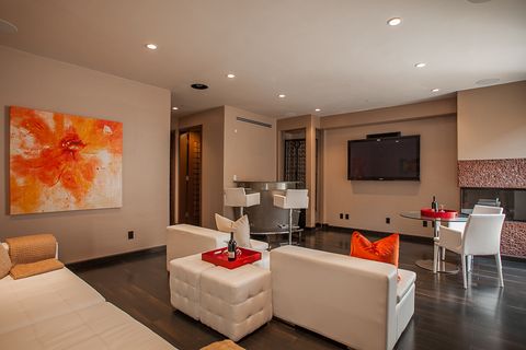 Room, Interior design, Floor, Wall, Flooring, Furniture, Ceiling, Interior design, Orange, Couch, 