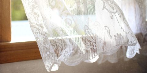 Textile, Lace, Embellishment, Interior design, Linens, Transparent material, Wood stain, Window treatment, Day dress, Pattern, 