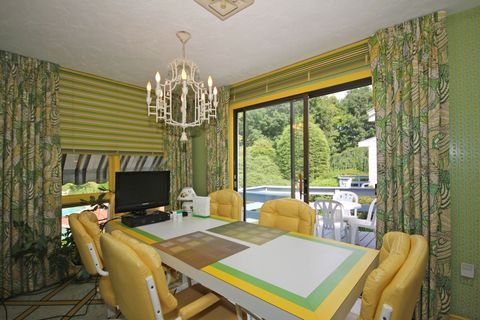 Green, Interior design, Room, Yellow, Wood, Property, Textile, Ceiling, Table, Interior design, 