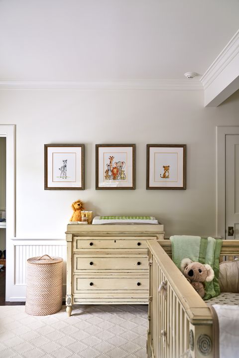 In baby Leonardo's room, the crib and dresser are from Restoration Hardware, the rug is from ABC Carpet & Home, the framed animal illustrations are from Etsy.