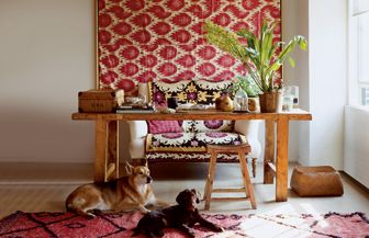 Red ikat fabric wall panel | Elle Decor 2006