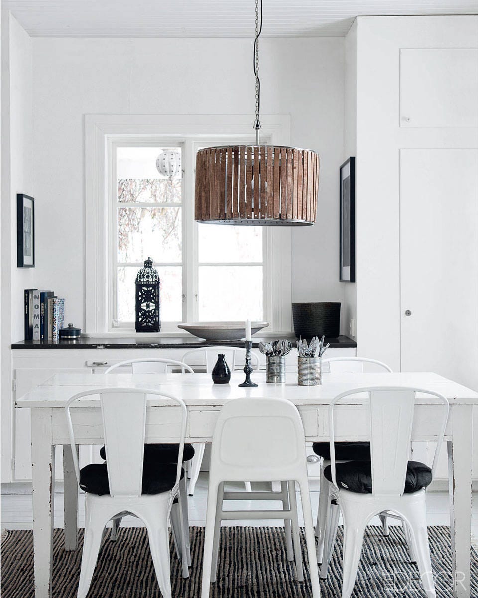 white dining room room with black and white furniture