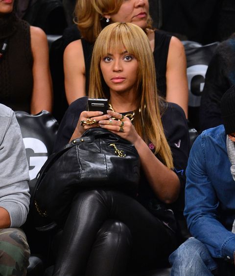 Beyonce on her cell phone