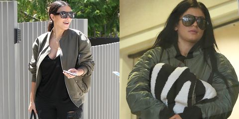 Kylie Jenner and Kim Kardashian twin in designer corset top