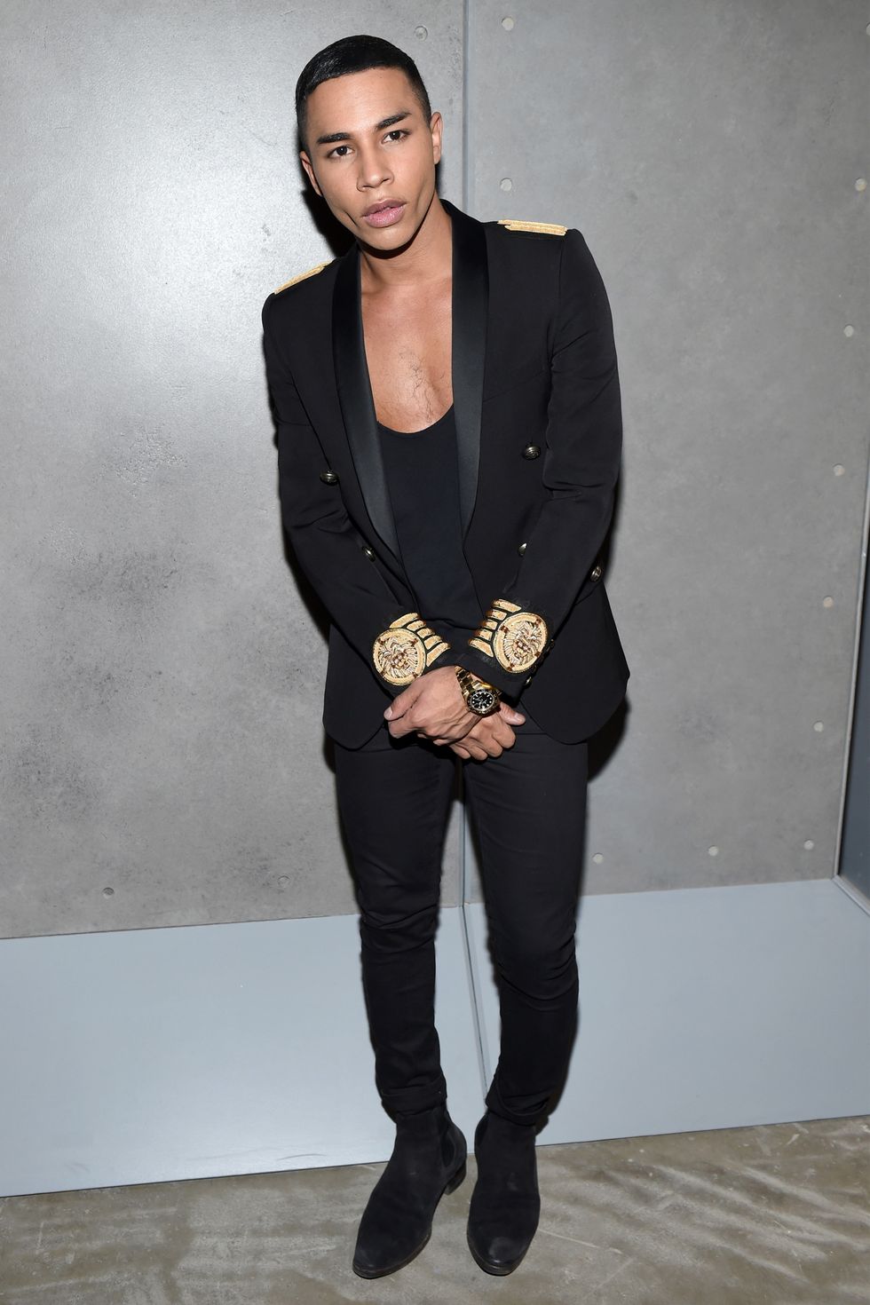 <p>Olivier Rousteing seemed to be the ultimate fashion prodigy when he attended the Ecole Supérieure des Arts et Techniques de la Mode in Paris as a teenager. A couple years after graduation, at the age of 20, he began his career as a designer for Roberto Cavalli. He was quickly promoted to the head of the Italian label's women's ready-to-wear collection, where he served five years as the creative director.</p>