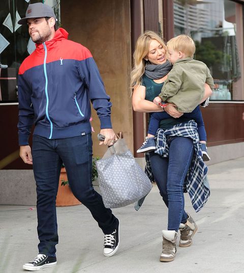 Boyfriends Carrying Their Girlfriends' Purses-Men Holding Bags for ...