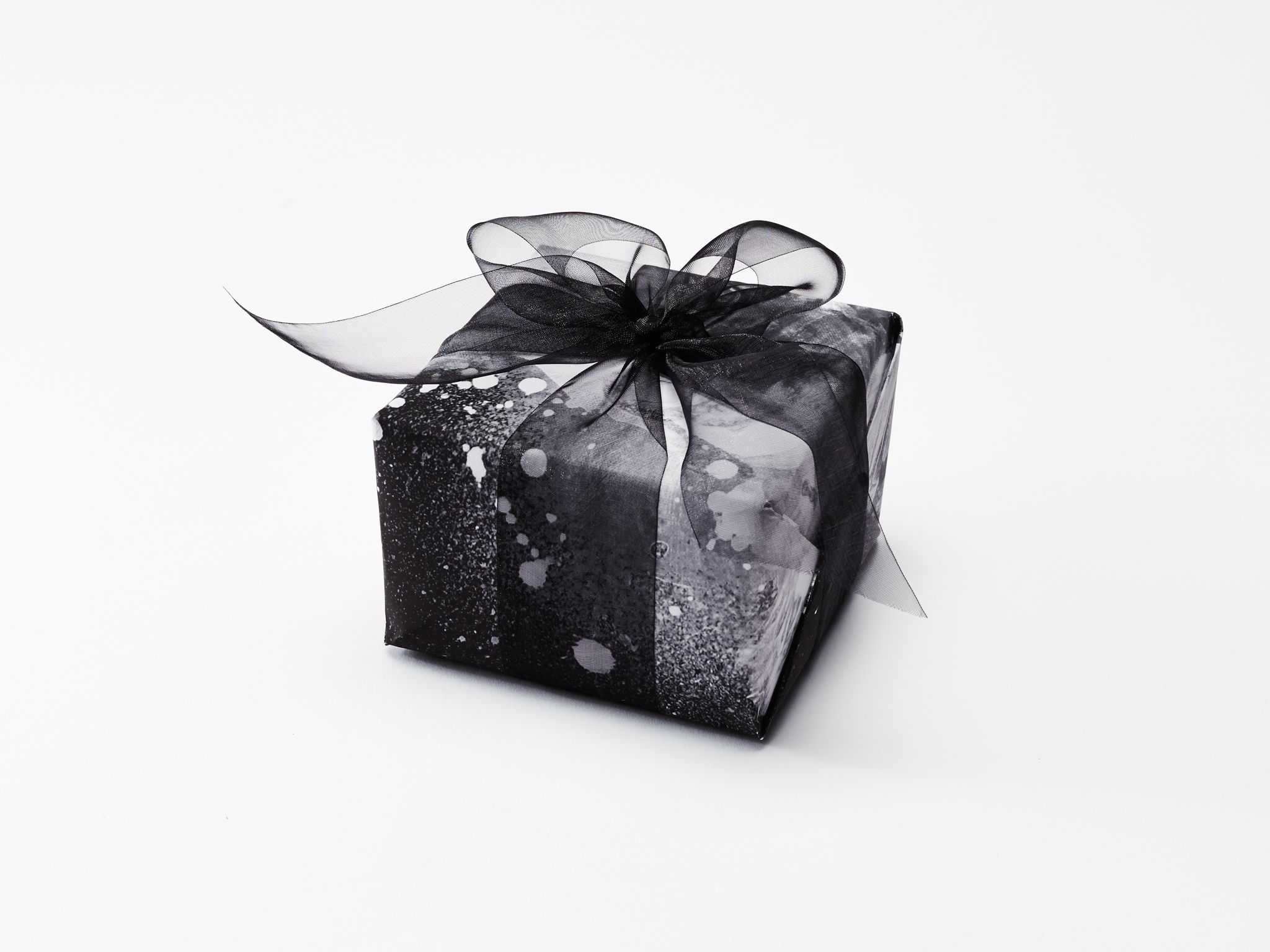How 13 Designers Gift Wrap Holiday Presents.