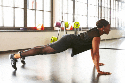 <p>Perform a traditional push-up to plank position. Alternate bringing your knees up toward your chest, and extend each leg back into plank. Perform another push-up and immediately repeat the sequence a total of 12 times. "This exercise conditions the <em>entire</em> body; the core, arms, quads, chest, hip flexors, and hamstrings," says Pisano.</p>