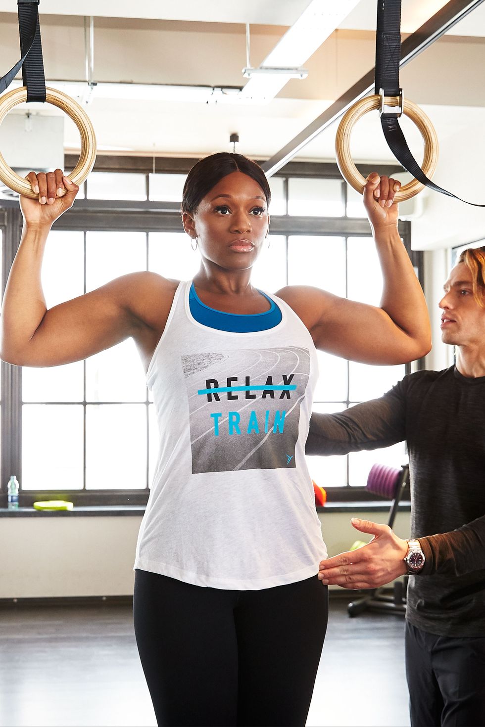 <p>"If you have something to hang on to that can fully support your weight, warm up with negative pull-ups," says Pisano. "Essentially you start in an engaged pull up position, and slowly lower yourself down. They're great for jumpstarting the biceps and activating the latissimus muscles in your back." </p><p>Old Navy Go-Dry Cool Graphic Tank in Island Tide, $10, <a href="http://oldnavy.gap.com/browse/product.do?cid=84254&vid=1&pid=938983532" target="_blank">oldnavy.com</a>; Old Navy High Support Racerback Sports Bra in Delta Hand, $19.94, <a href="http://oldnavy.gap.com/browse/product.do?cid=1034331&vid=1&pid=429322112" target="_blank">oldnavy.com</a>; Fabletics Provence Leggings in Black/Liquid Black, $79.95, <a href="http://www.fabletics.com/index.cfm?action=shop.viewproduct&ha=863E11D5482766AF6A9A963579F6CC5B&pid=4867582" target="_blank">fabletics.com</a>; Nike Air Zoom Fit Agility 2 in Black/White, $130, <a href="http://store.nike.com/us/en_us/pd/air-zoom-fit-agility-2-training-shoe/pid-10337859/pgid-10337860" target="_blank">nike.com</a></p>