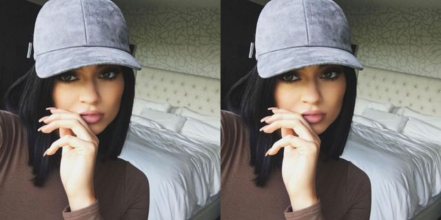 Why Kylie Jenner Always Poses With Her Fingers on Her Lips in Photos