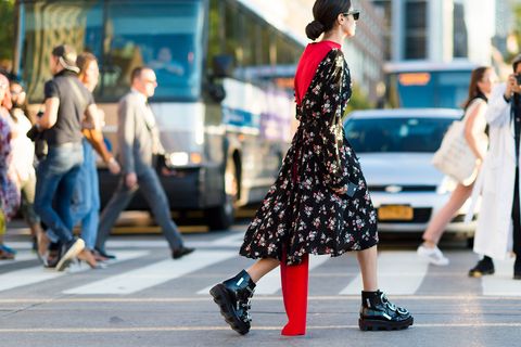 <p>Toughen up a floral midi dress with heavy duty ankle boots. </p>