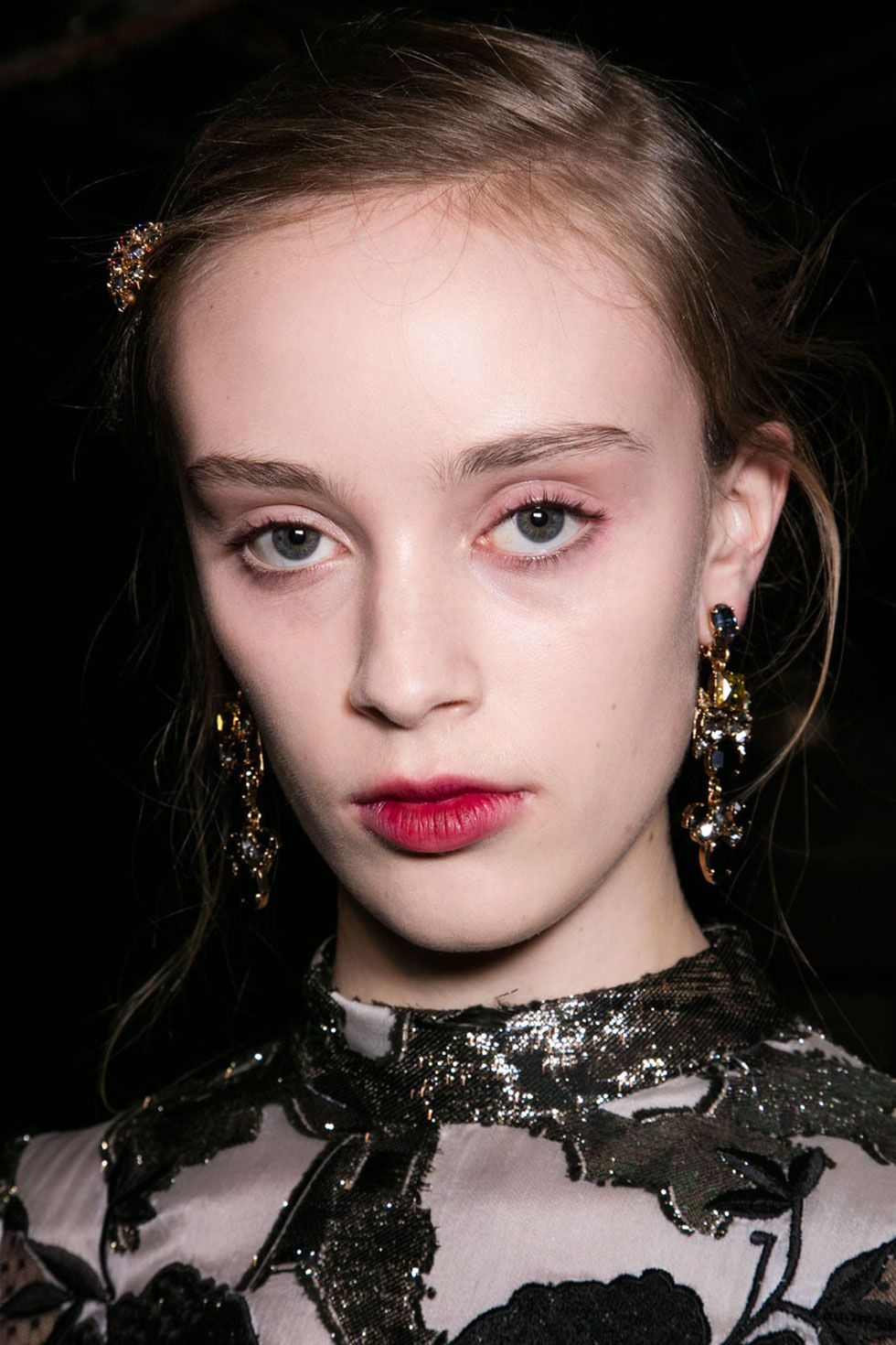 <p>"Nobody's going to go out with a graphic neon eyeliner that goes all the way up to your eyebrow," Teasdale says, "But if you dare to experiment, you'll find that a lot of those electric neon colors actually look really nice as a color wash on your lids, or as a cat-eye."</p><p>Erdem must have psychically beamed himself into our conversation—his models had sheer neon lids that made a sublime contrast to their ivory lace dresses.</p>