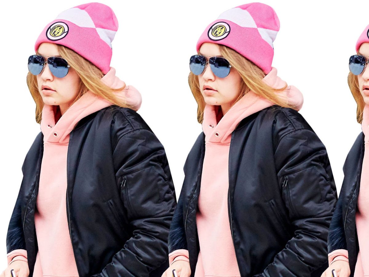 Gigi Hadid wearing a pink outfit as she returns to her apartment in New  York City