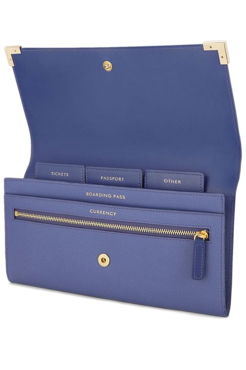 <p>Regular sized passport holders never make sense—where are you supposed to tuck away that flimsy boarding pass? Instead, go for an oversized <span class="highlight">travel</span> wallet like this one by Smythson. It includes tabs that organize your tickets, documents, and dinero. </p><p><em>Smythson Grosvenor Corners Marshall <span class="highlight">Travel</span> Wallet, $405; </em><a href="http://www.smythson.com/us/dawn-blue-grosvenor-corners-marshall-travel-wallet.html" target="_blank"><em>smythson.com</em></a></p>