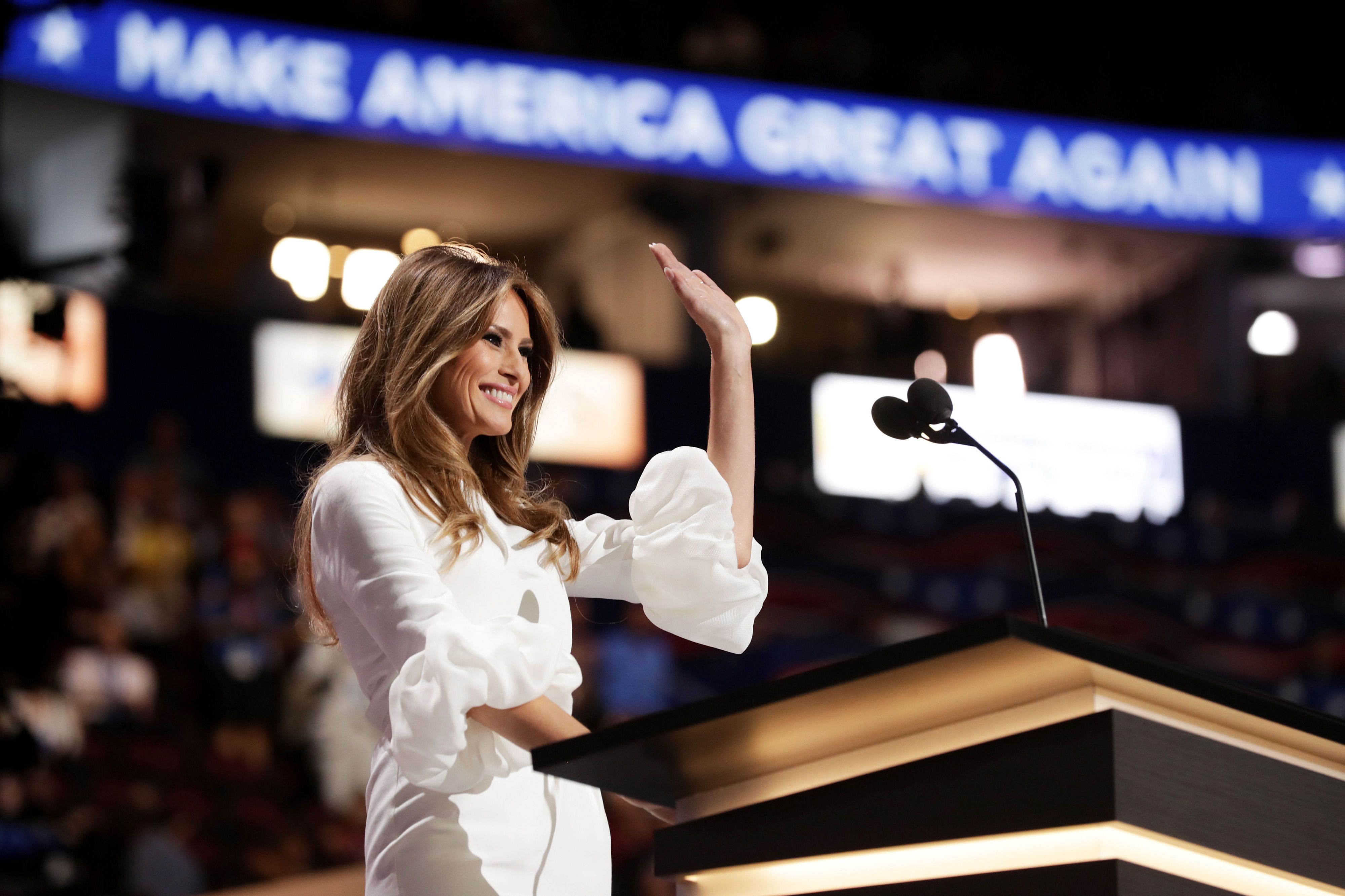 Melania trump red cape clearance dress