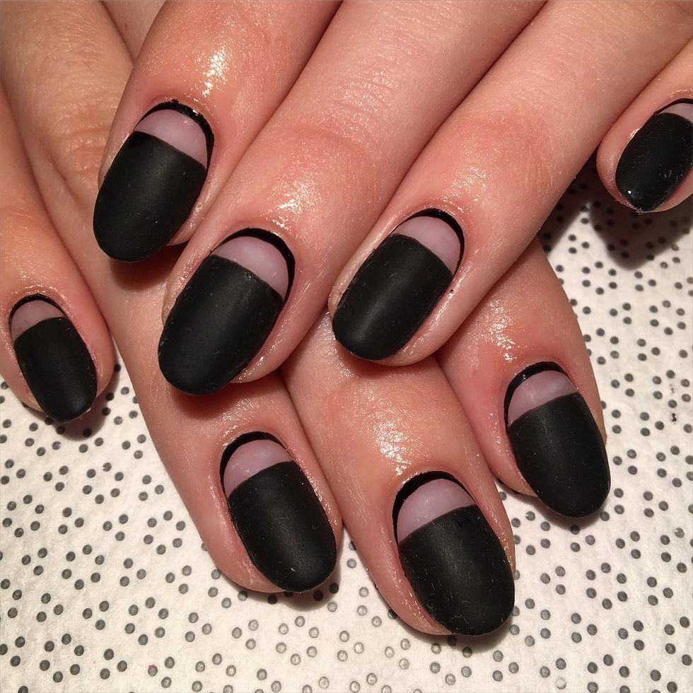 <p>Or, reverse the design of the last nail for this design. Start by taping off your half moon. Add a matte black polish and wait to dry. Remove the tape, then outline the base of your nail in the same color. </p><p>Design by <a href="https://www.instagram.com/p/BB1AWEXDOU2/" target="_blank">@rosebnails</a></p>